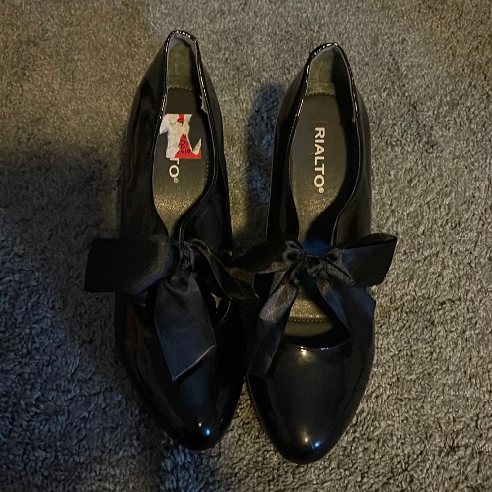 Black bow heels